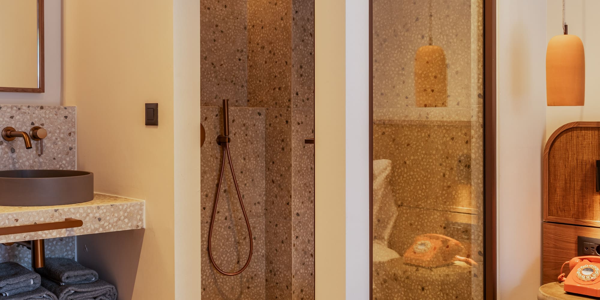 a bathroom with a shower and sink