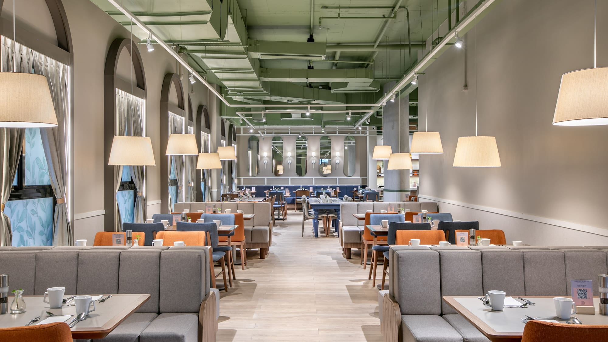 a restaurant with tables and chairs