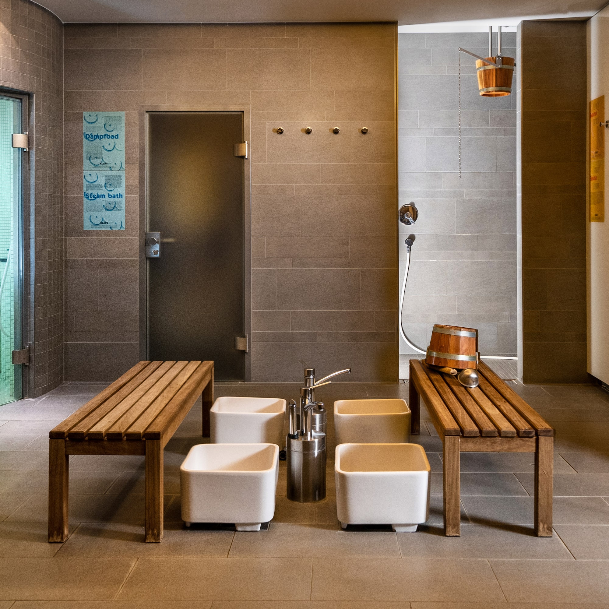 a bathroom with a bench and benches