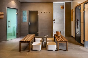 a bathroom with a bench and benches