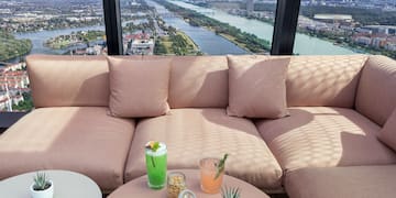 a couch with drinks on a table