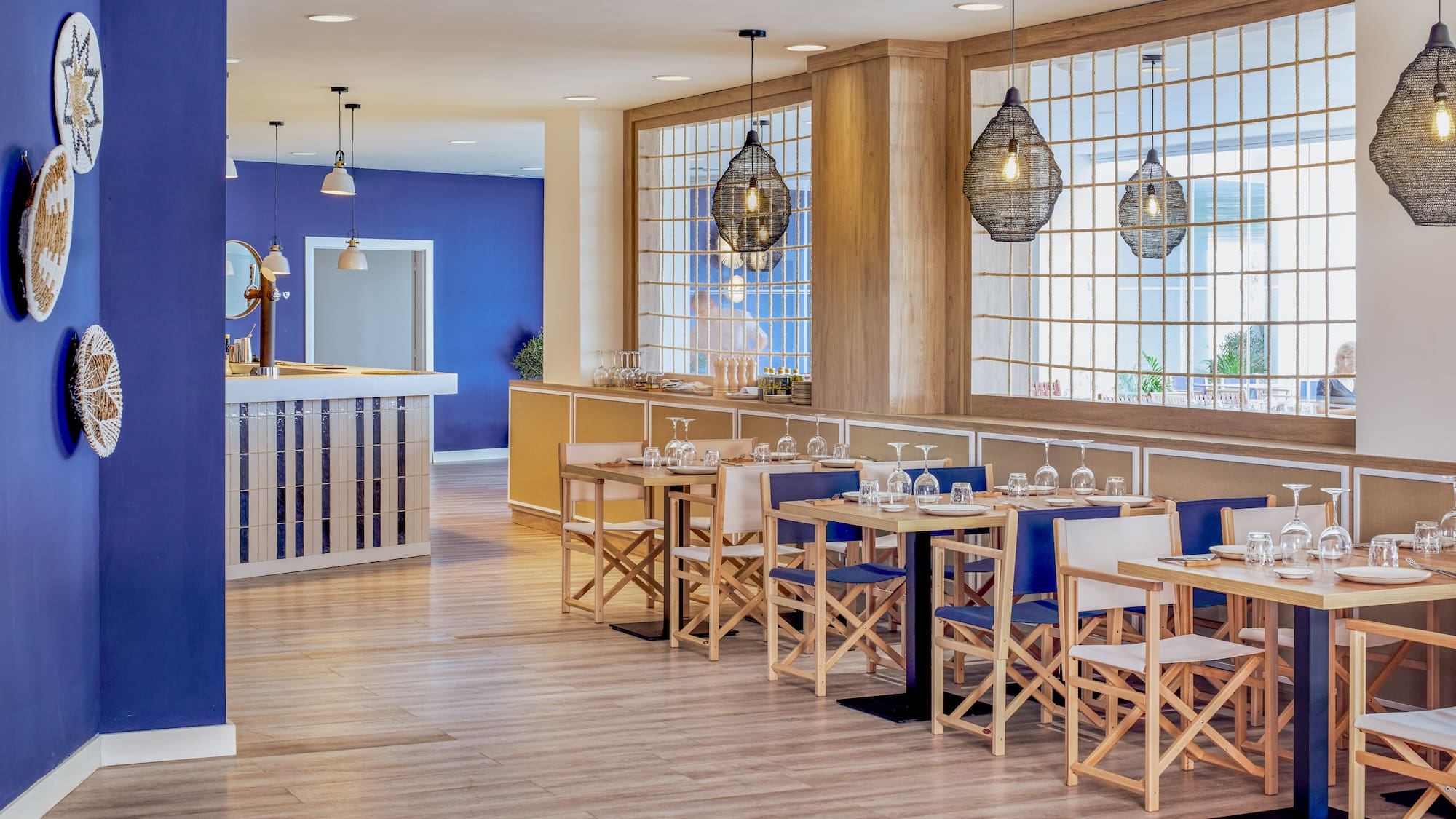 a room with tables and chairs