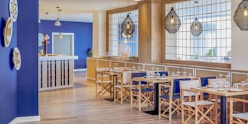 a room with tables and chairs