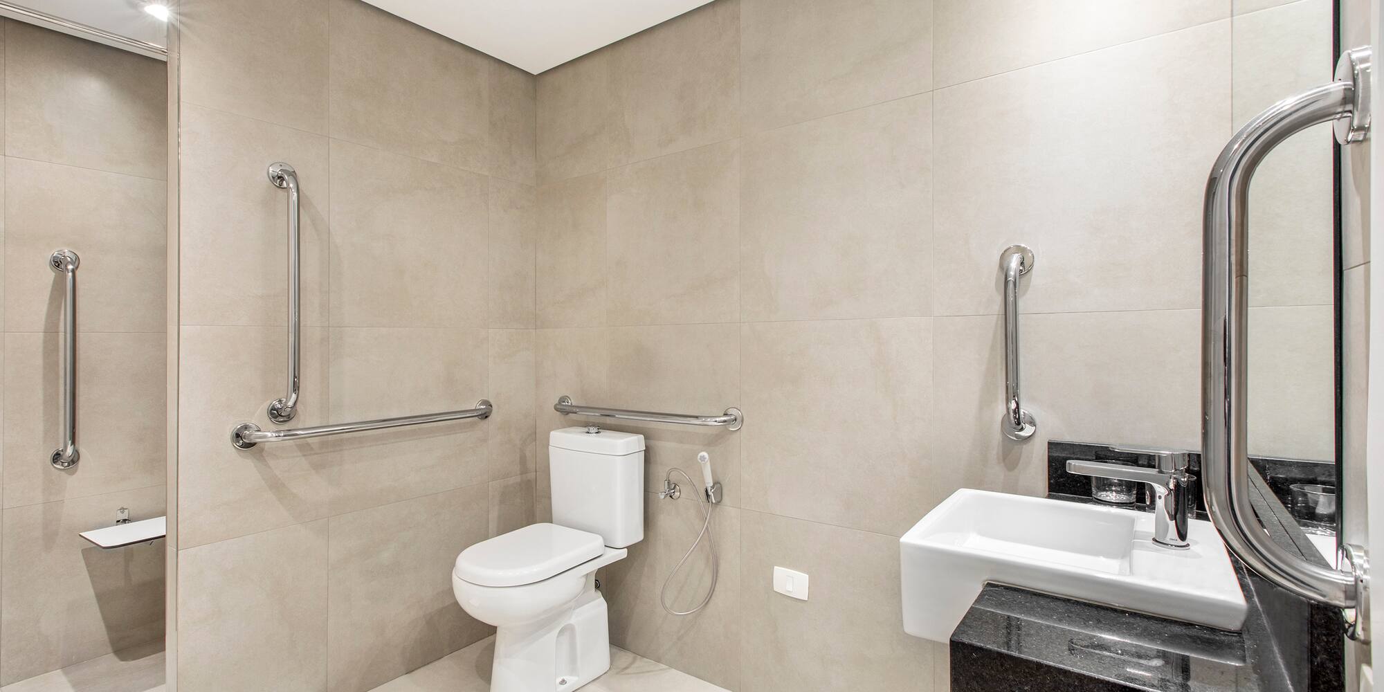 a bathroom with a toilet sink and a toilet