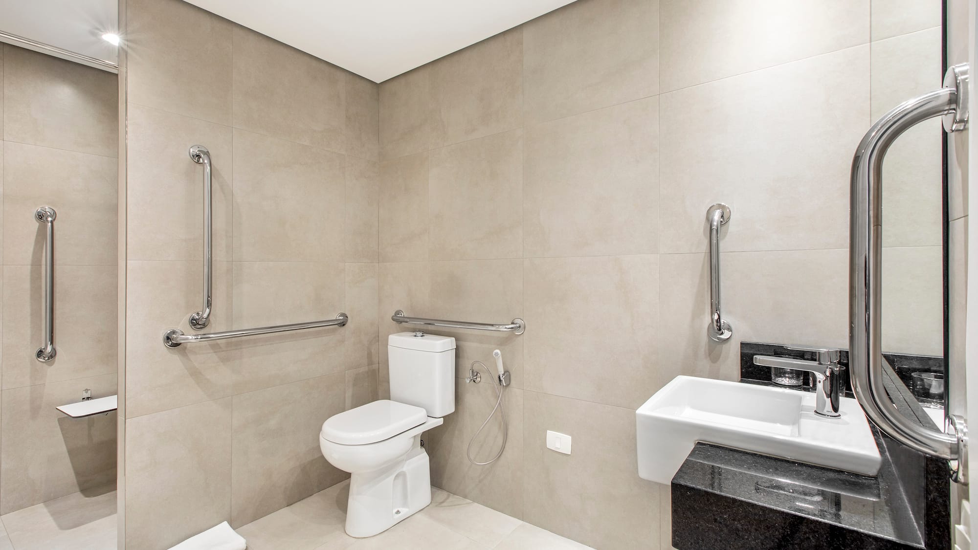 a bathroom with a toilet sink and a toilet