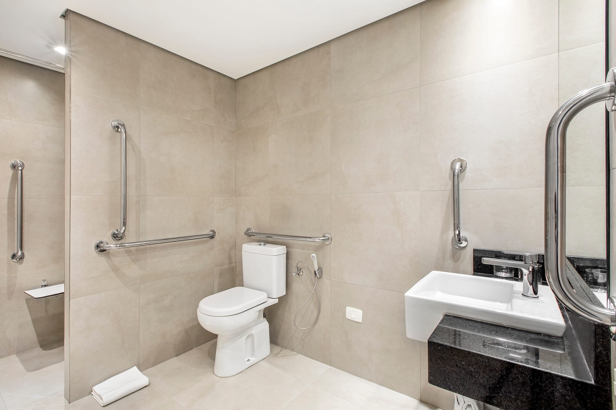 a bathroom with a toilet sink and a toilet