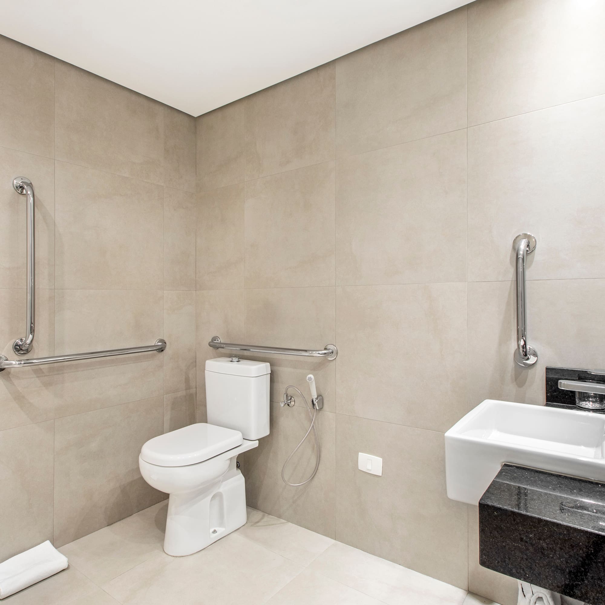 a bathroom with a toilet sink and a toilet