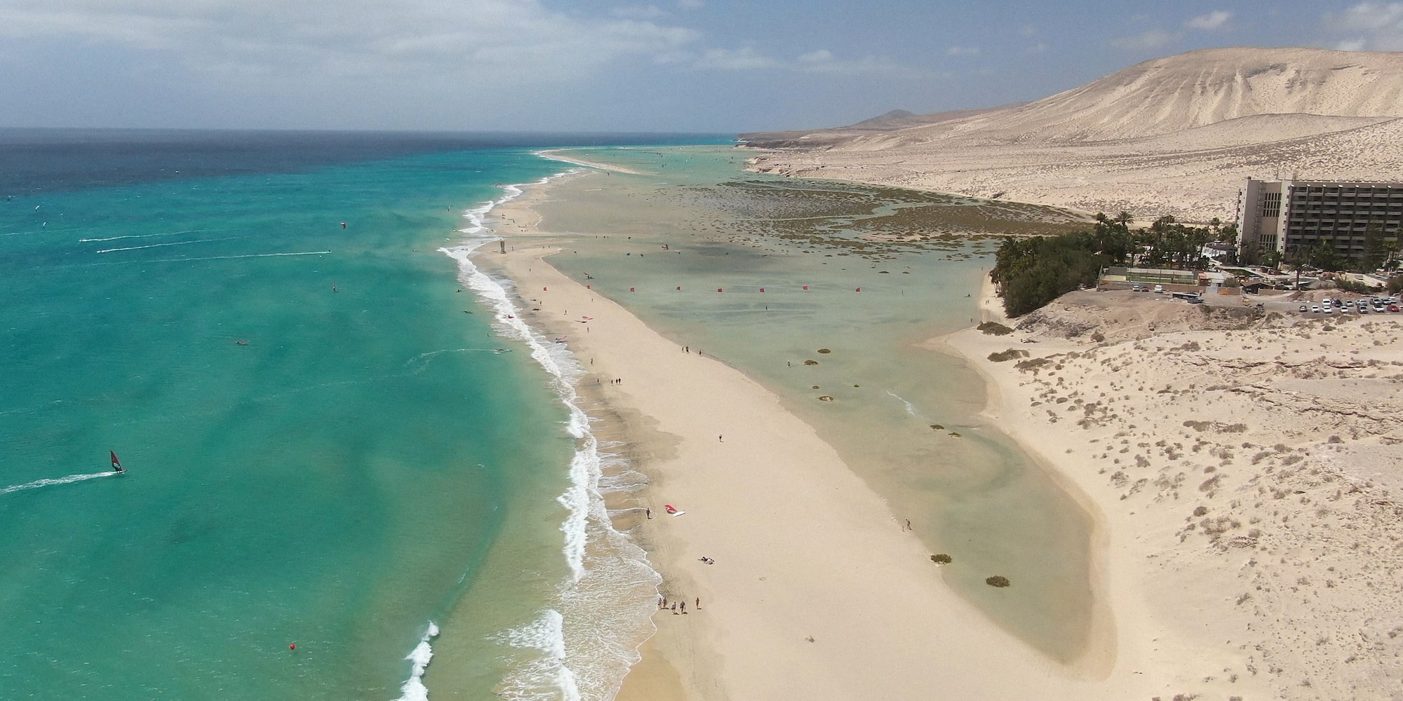 a beach with sand and water