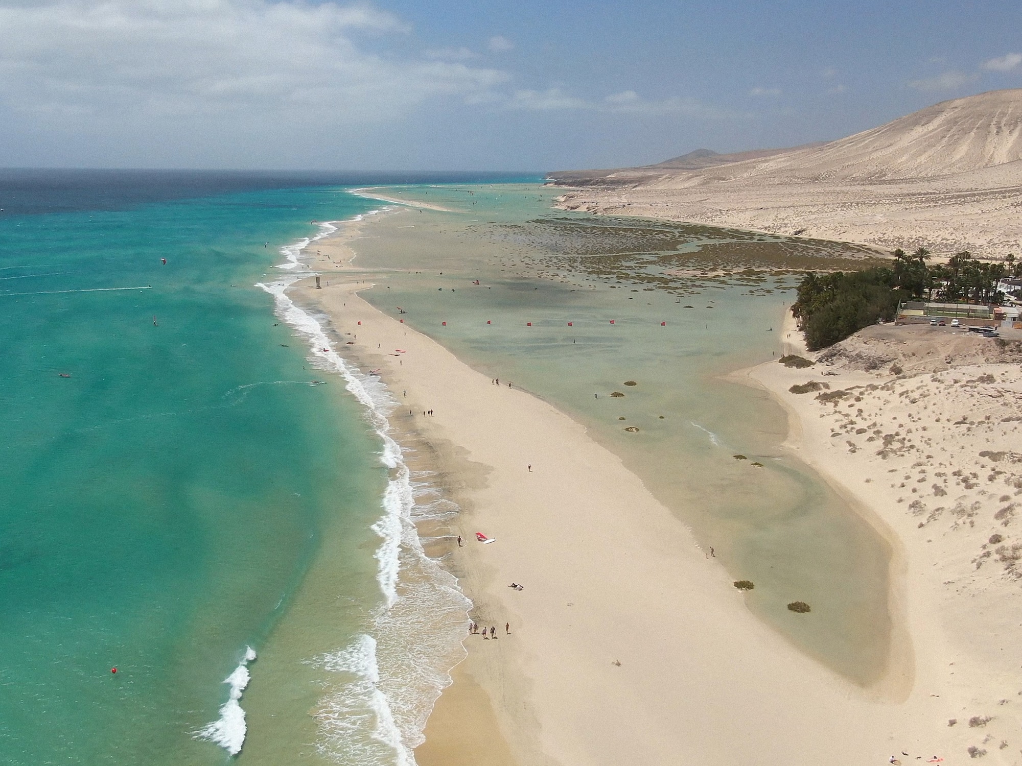 a beach with sand and water