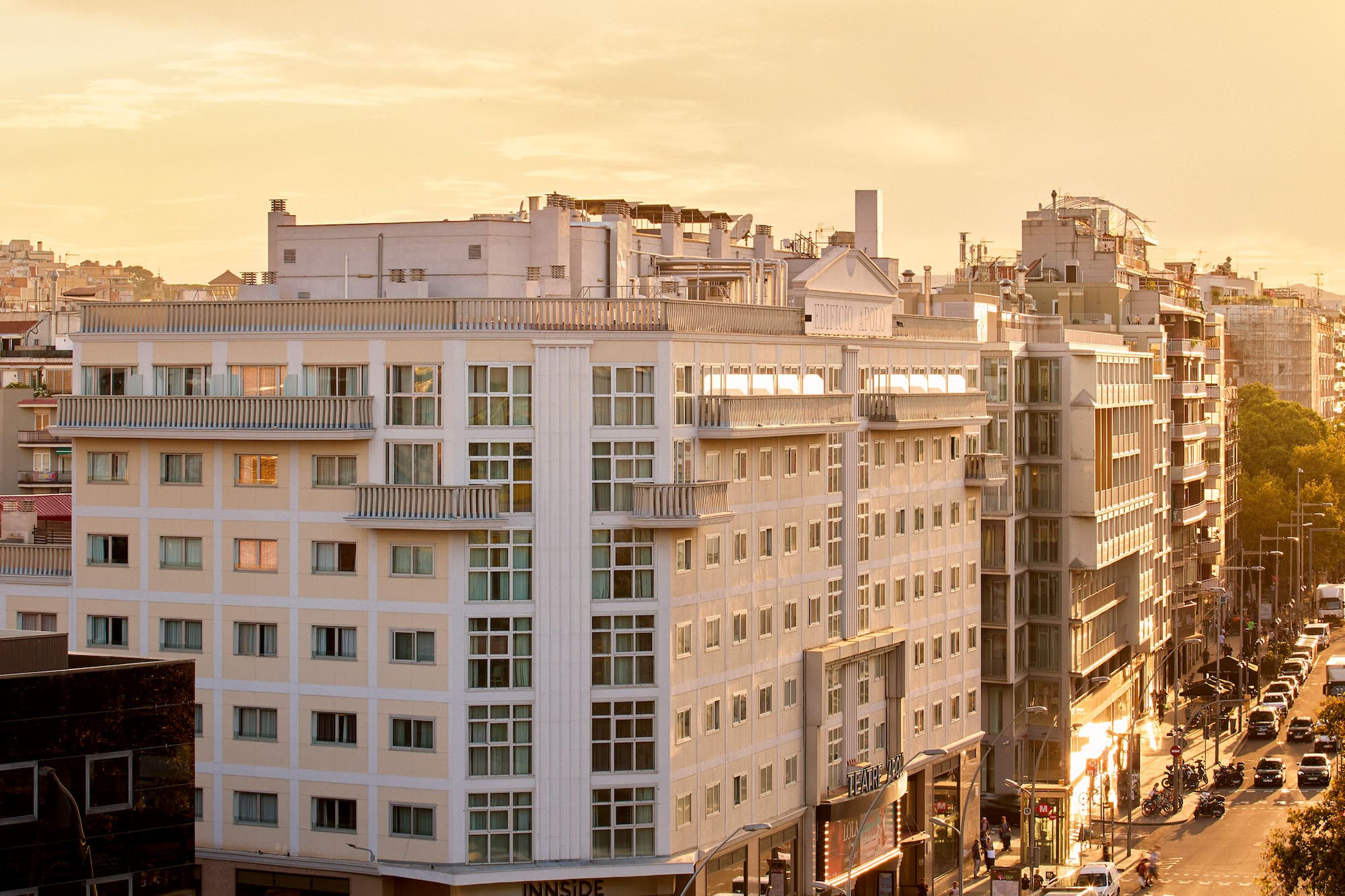 a city street with cars and buildings