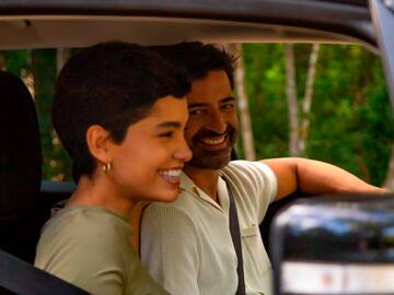 a man and woman in a car