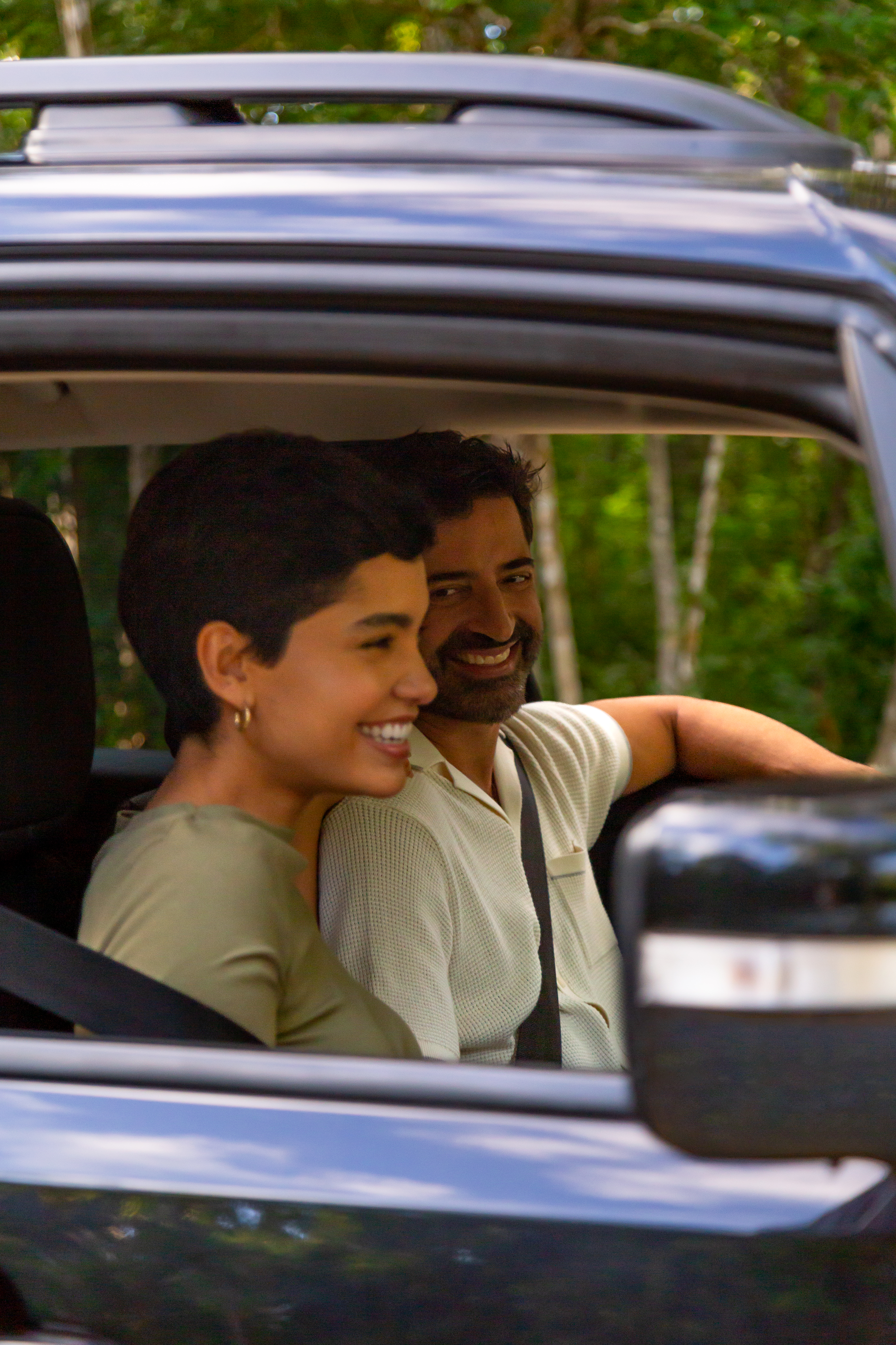 a man and woman in a car