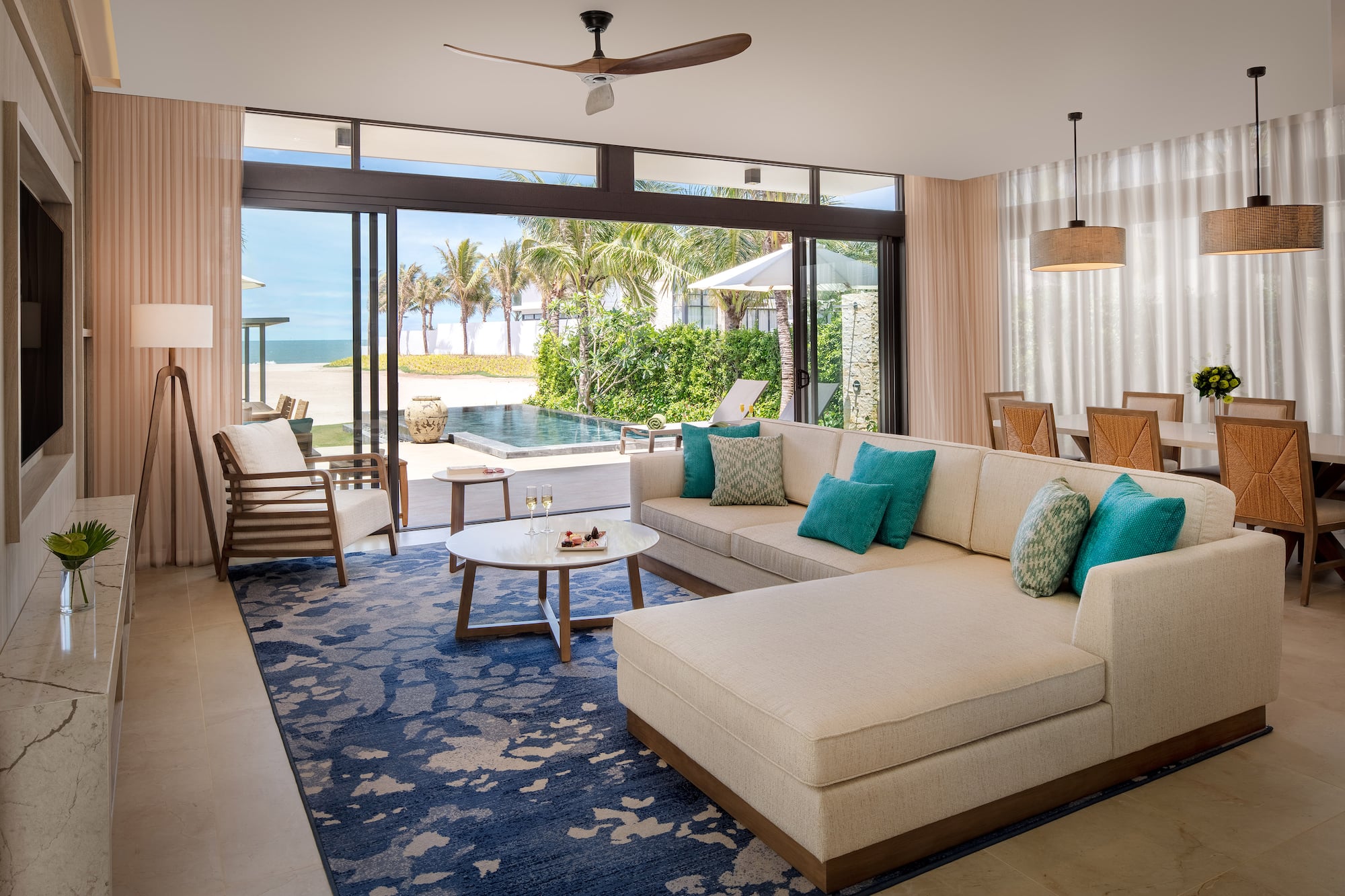 a living room with a large couch and a table