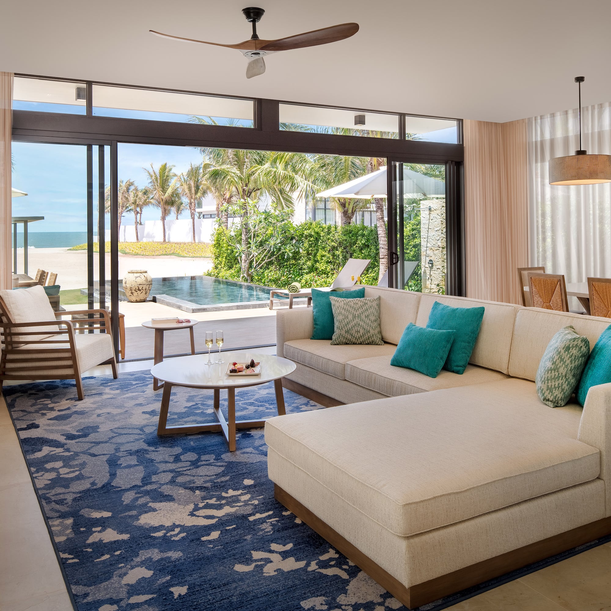 a living room with a large couch and a table