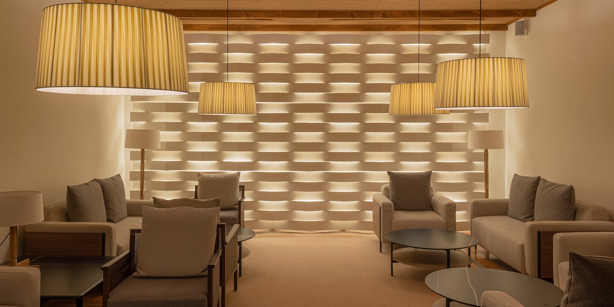 a room with couches and chairs