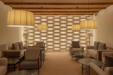 a room with couches and chairs