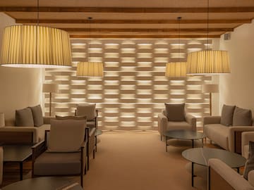 a room with couches and chairs