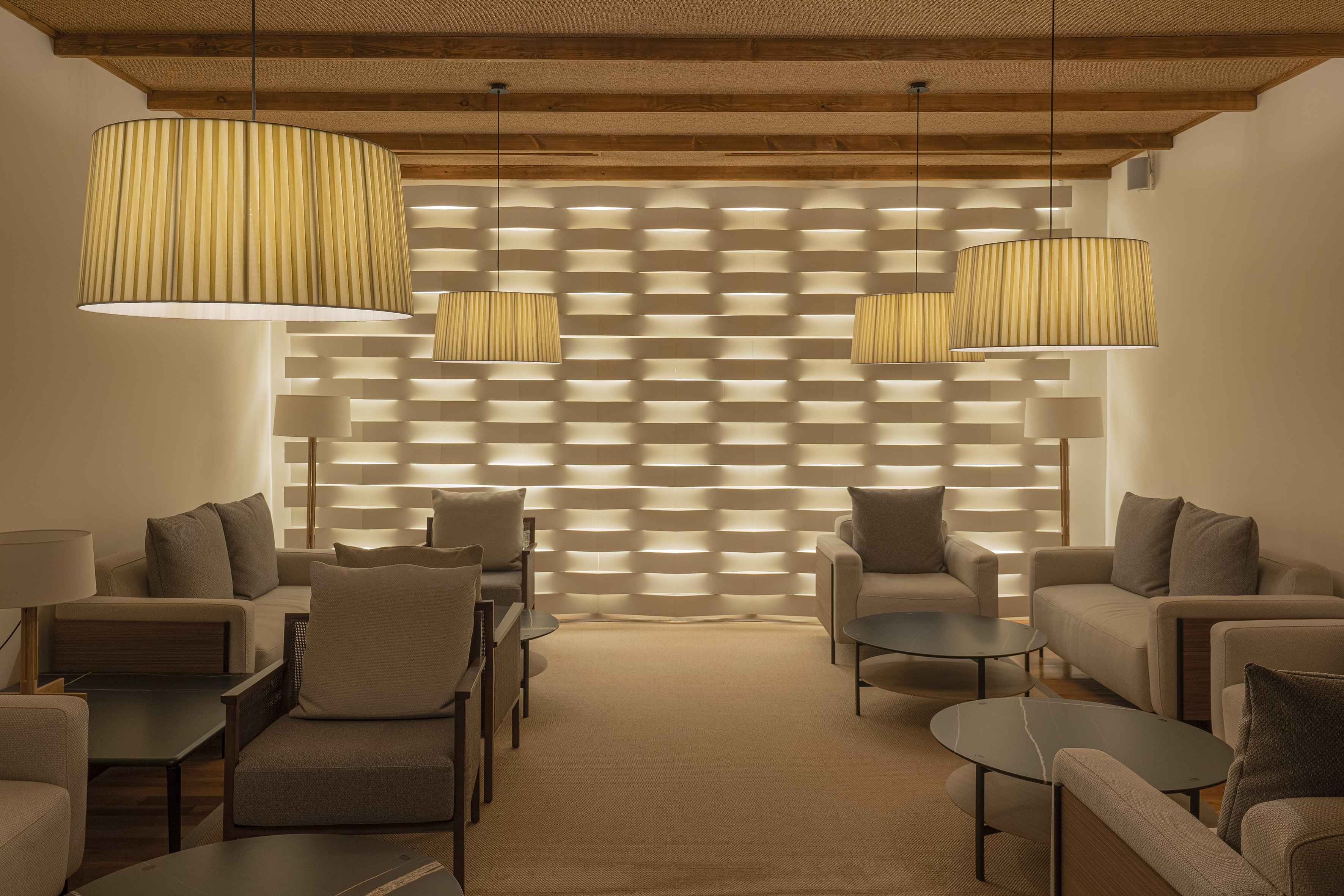 a room with couches and chairs