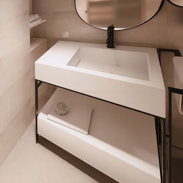 a bathroom with a sink and a round mirror