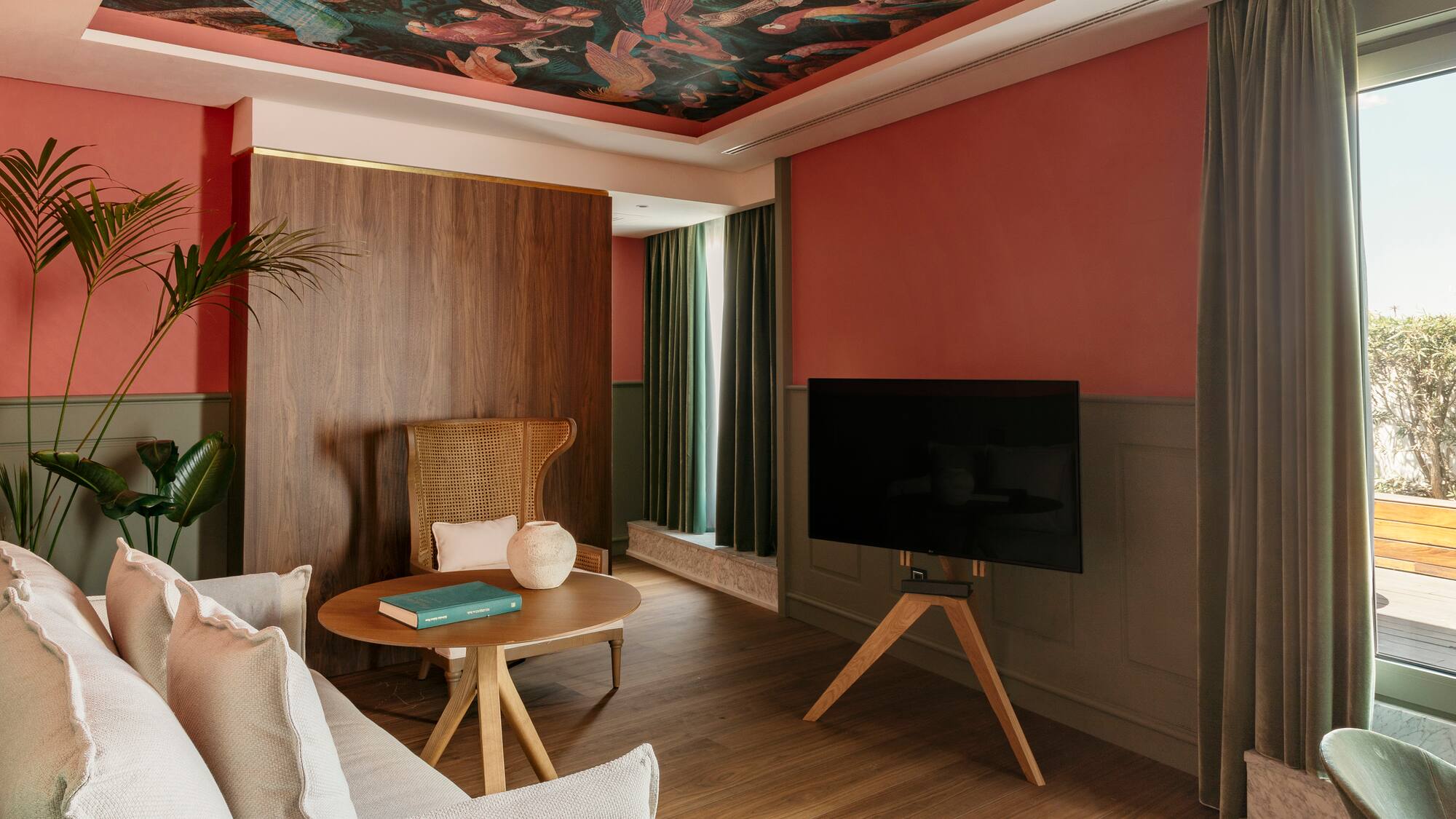 a living room with a tv and a table