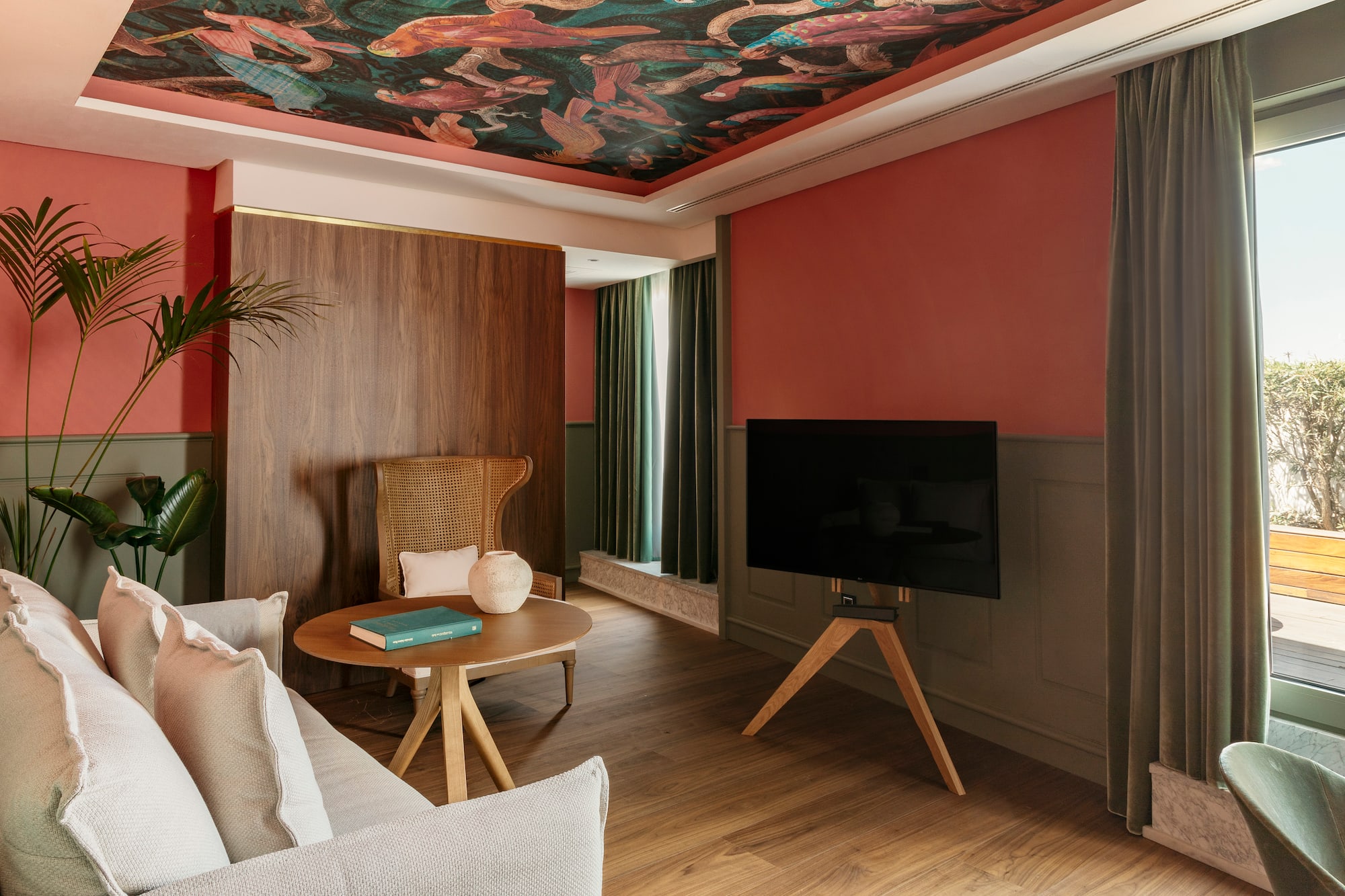 a living room with a tv and a table