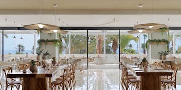 a room with tables and chairs