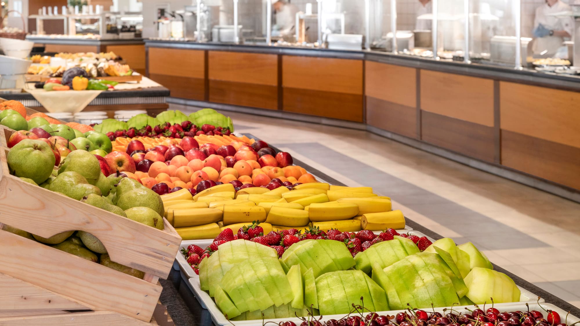 a buffet table full of fruit