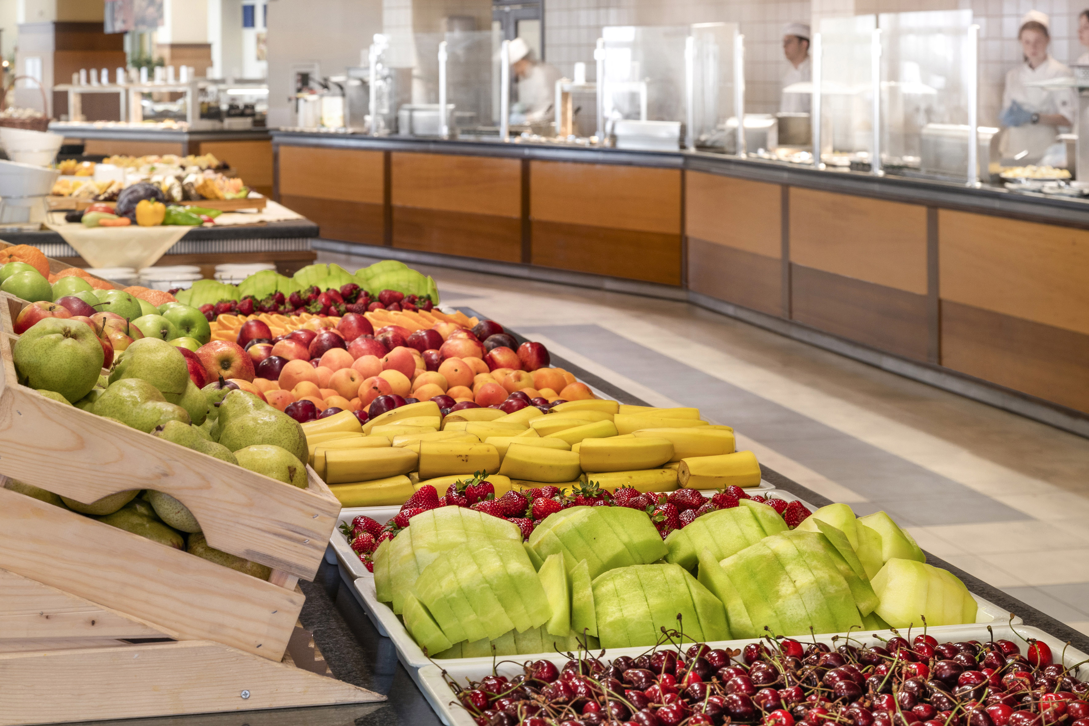 a buffet table full of fruit