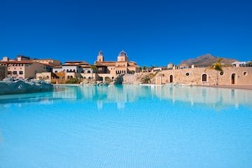 a pool with a building in the background