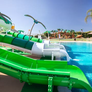 a water slide in a pool
