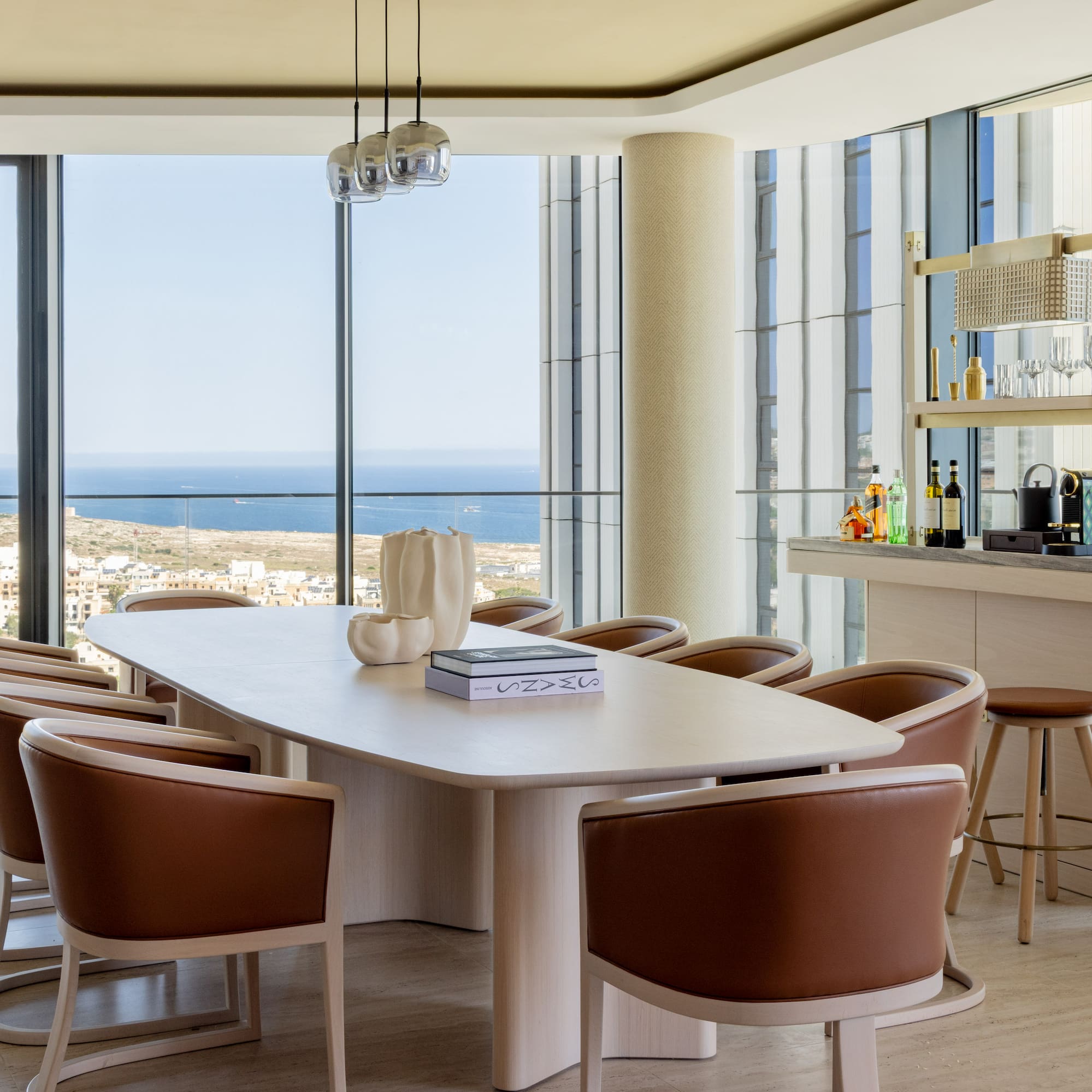 a room with a table and chairs