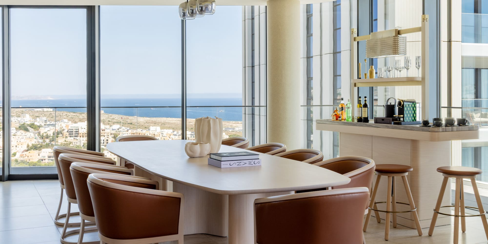 a room with a table and chairs