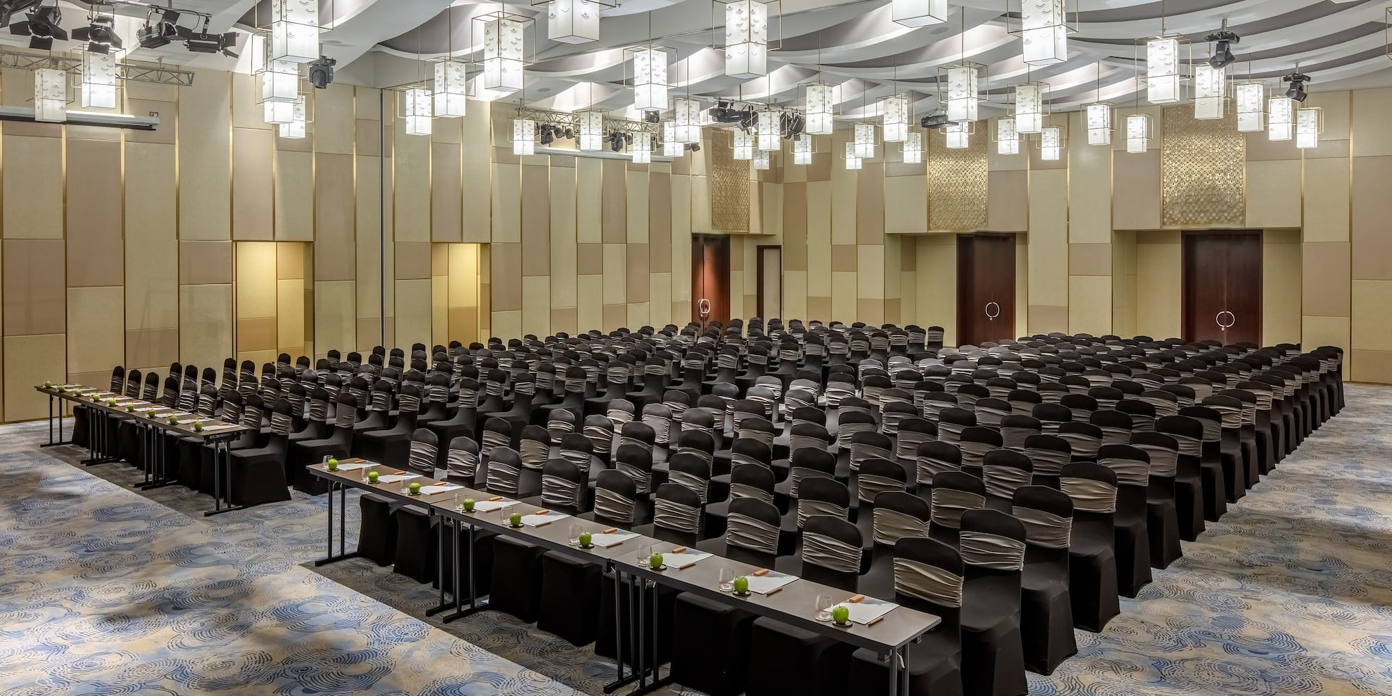 a large room with many chairs and tables