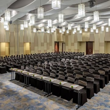 a large room with many chairs and tables