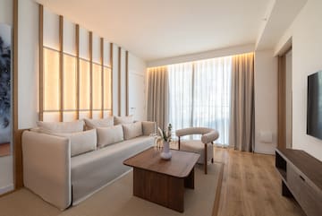 a living room with a couch and a coffee table