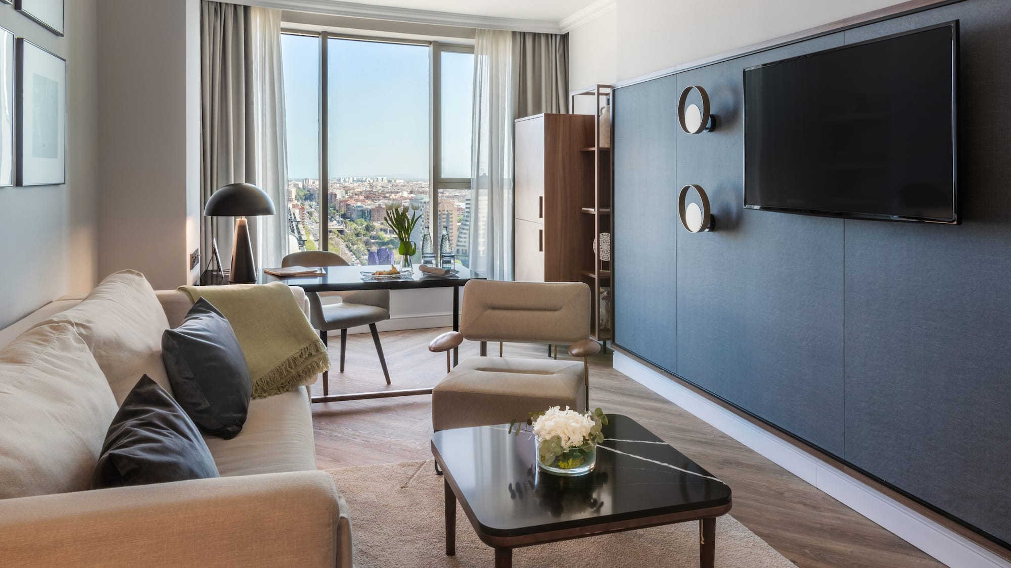 a living room with a tv and a table