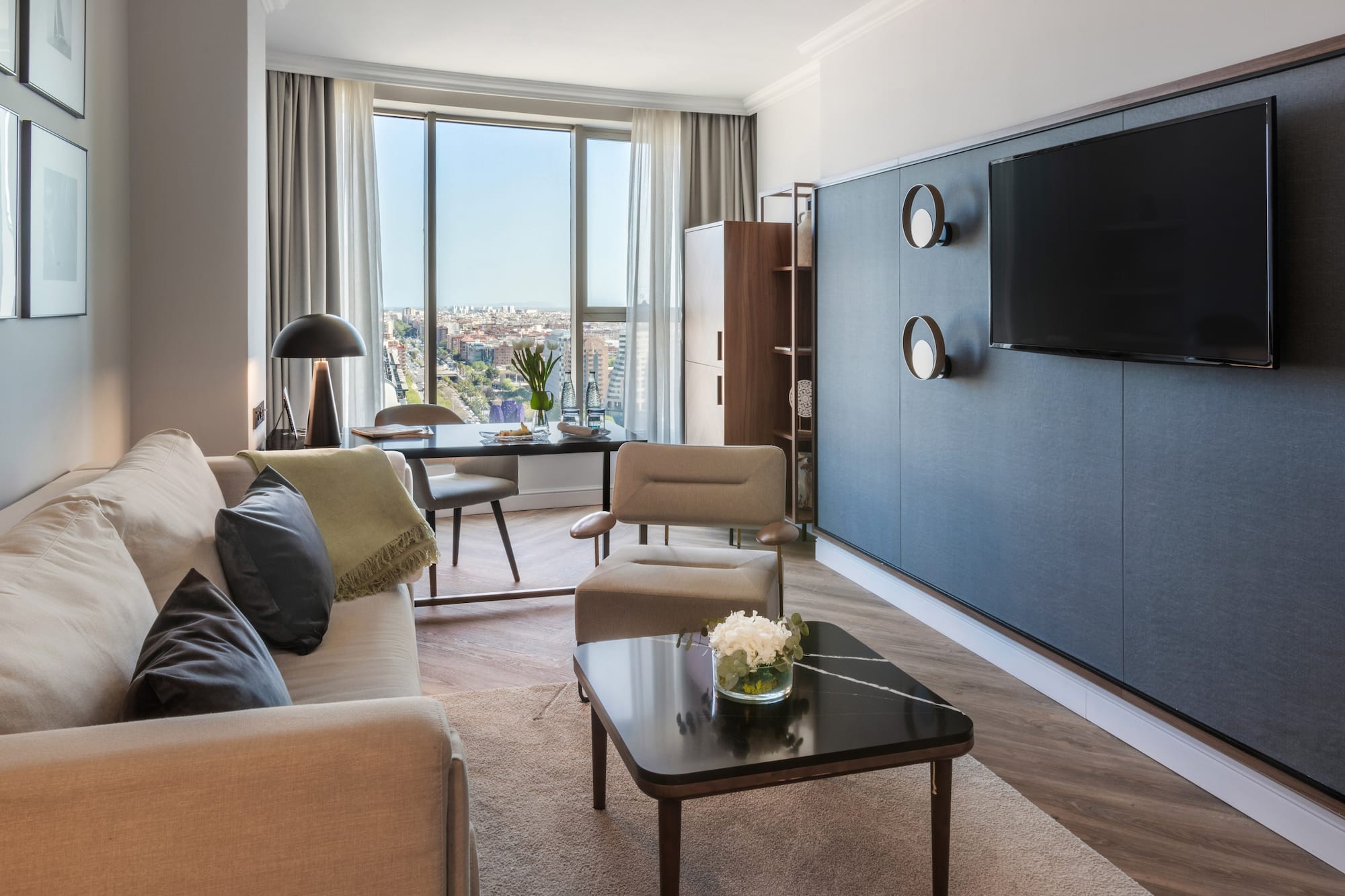 a living room with a tv and a table
