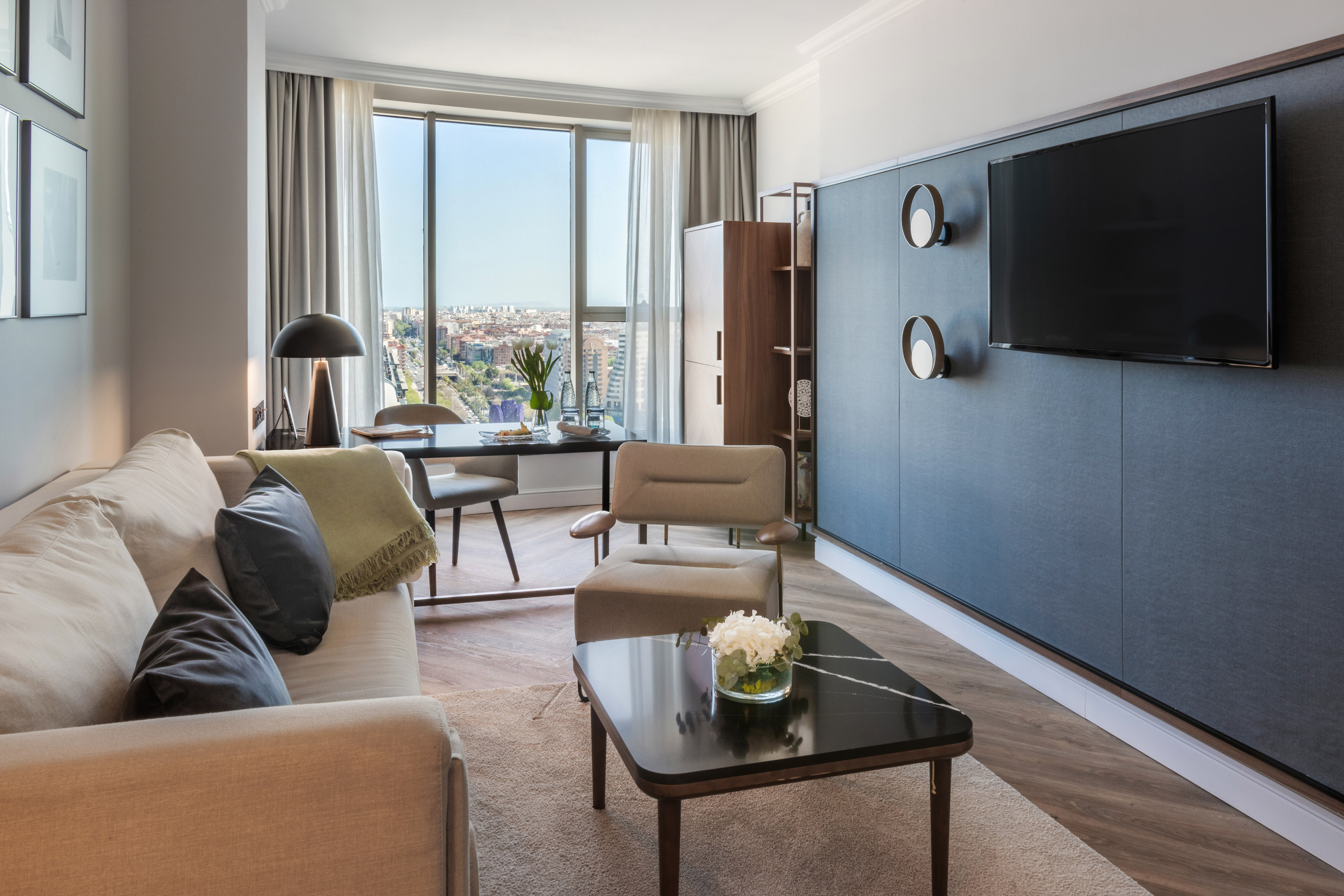 a living room with a tv and a table