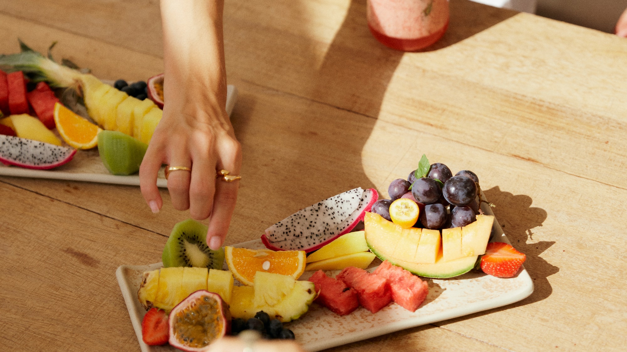 a group of people eating fruit
