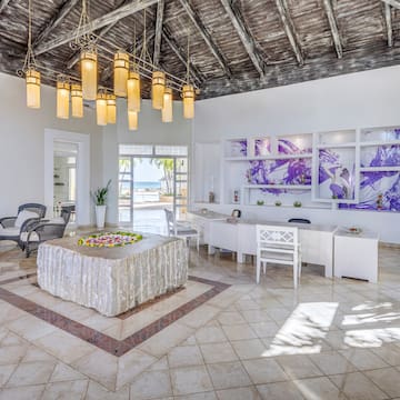 a room with a table and chairs