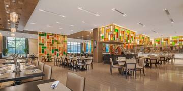 a restaurant with tables and chairs