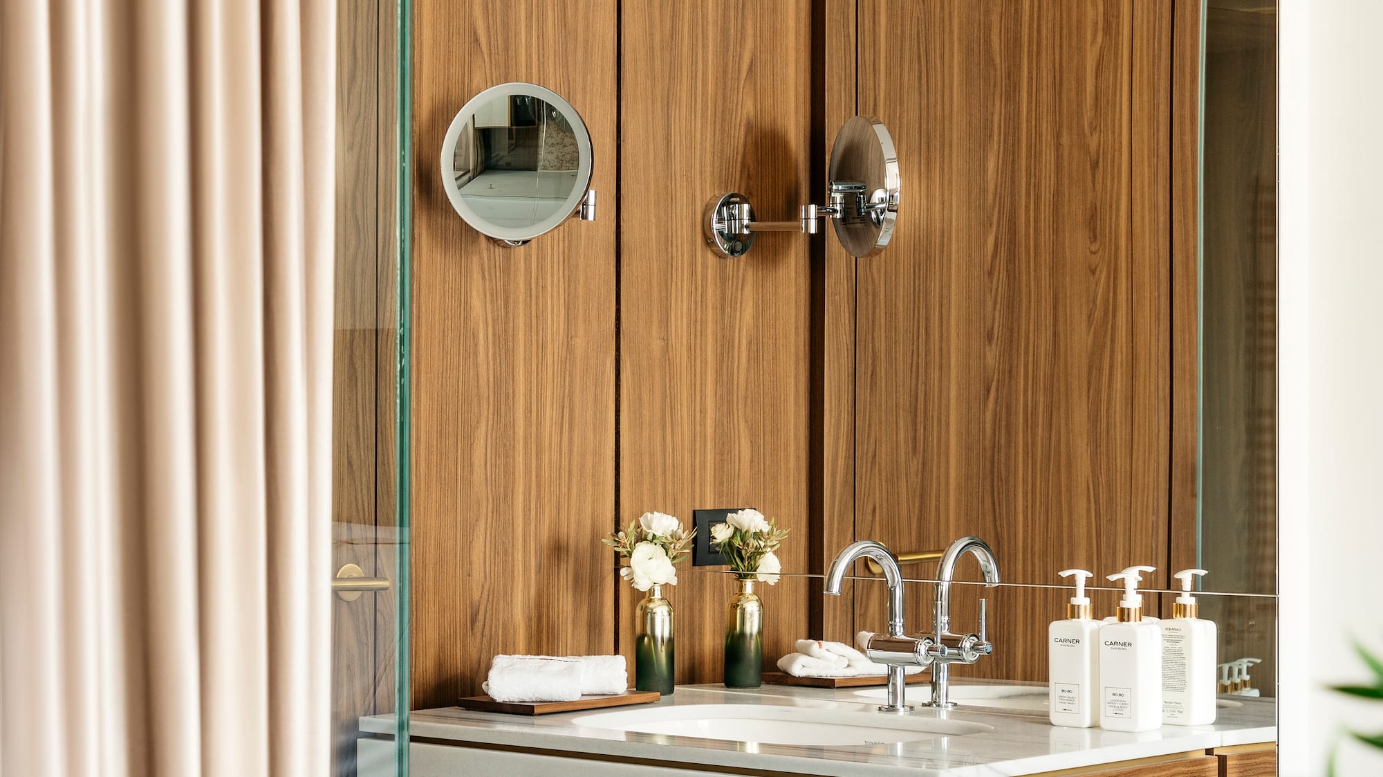 a bathroom with a mirror and sink