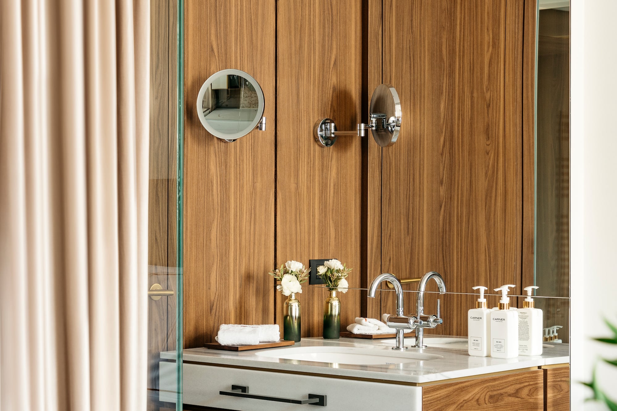 a bathroom with a mirror and sink