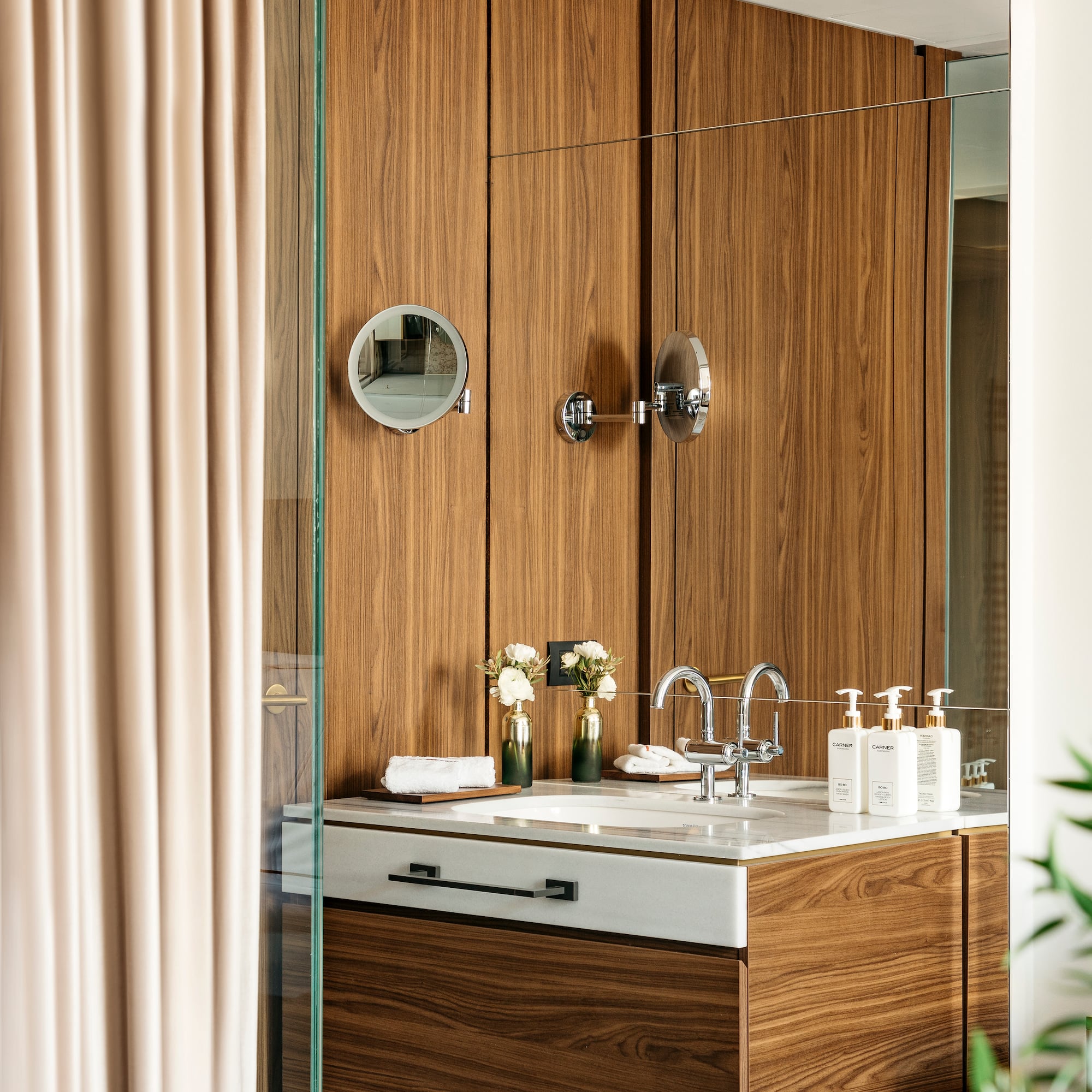 a bathroom with a mirror and sink