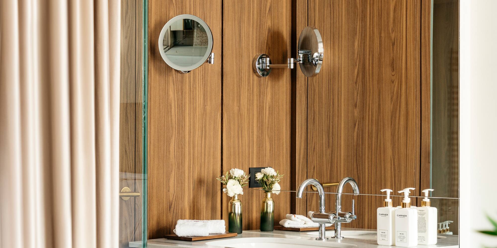 a bathroom with a mirror and sink