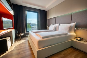 a room with a bed and a window