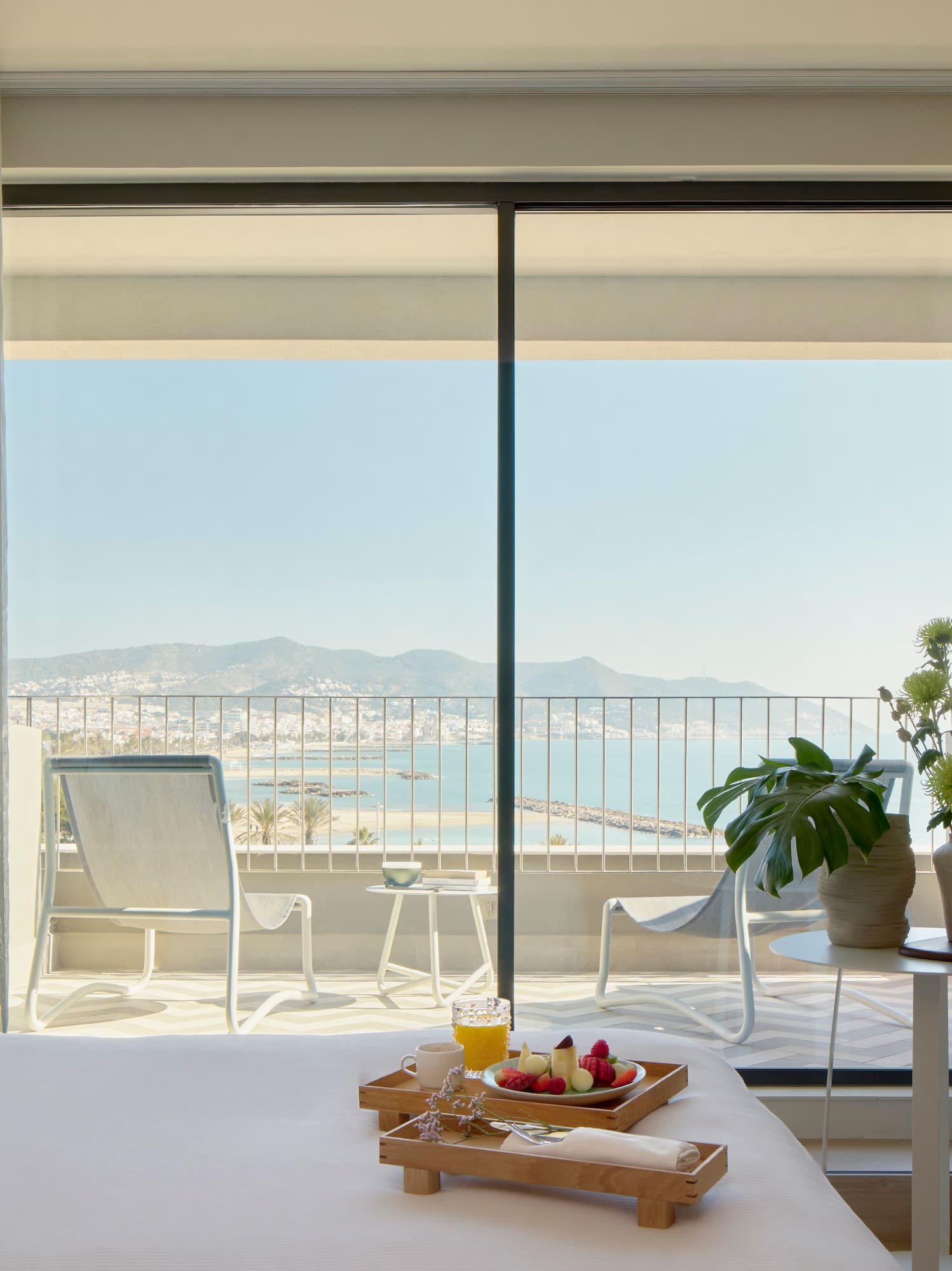 a room with a bed and a table with chairs and a table with chairs and a table with chairs and a table with chairs and a table with chairs and a table with chairs and a table with