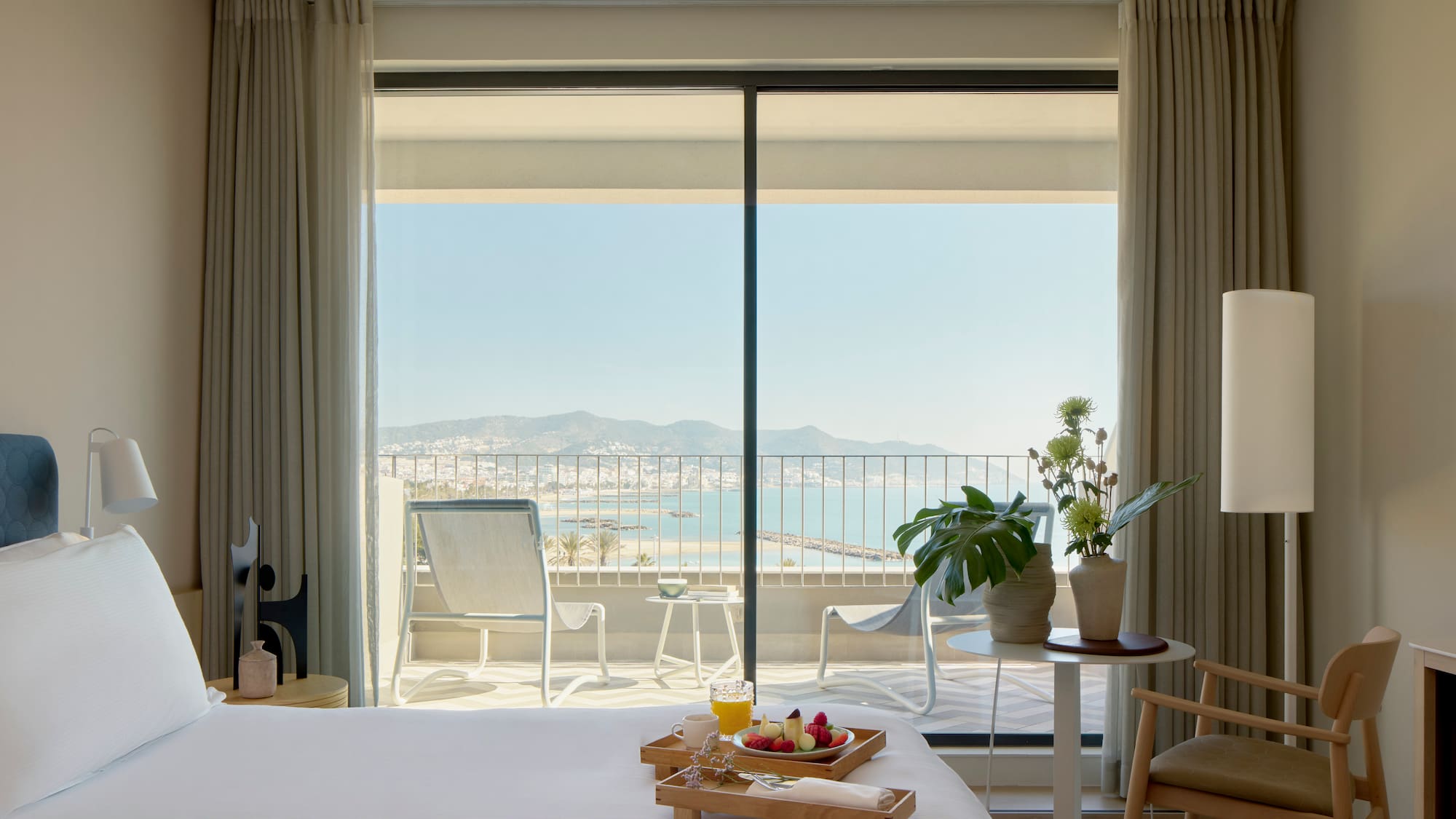 a room with a bed and a table with chairs and a table with chairs and a table with chairs and a table with chairs and a table with chairs and a table with chairs and a table with