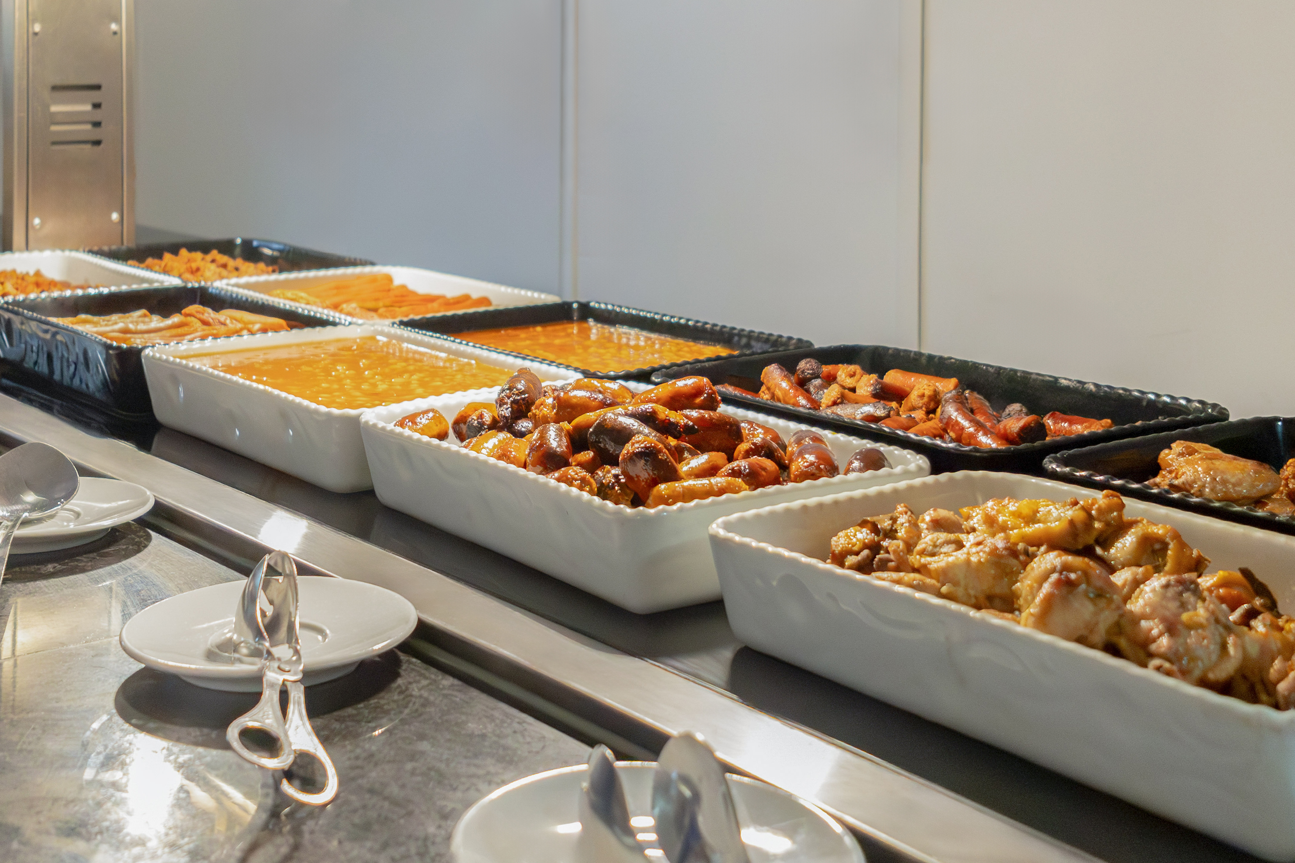a buffet line of food