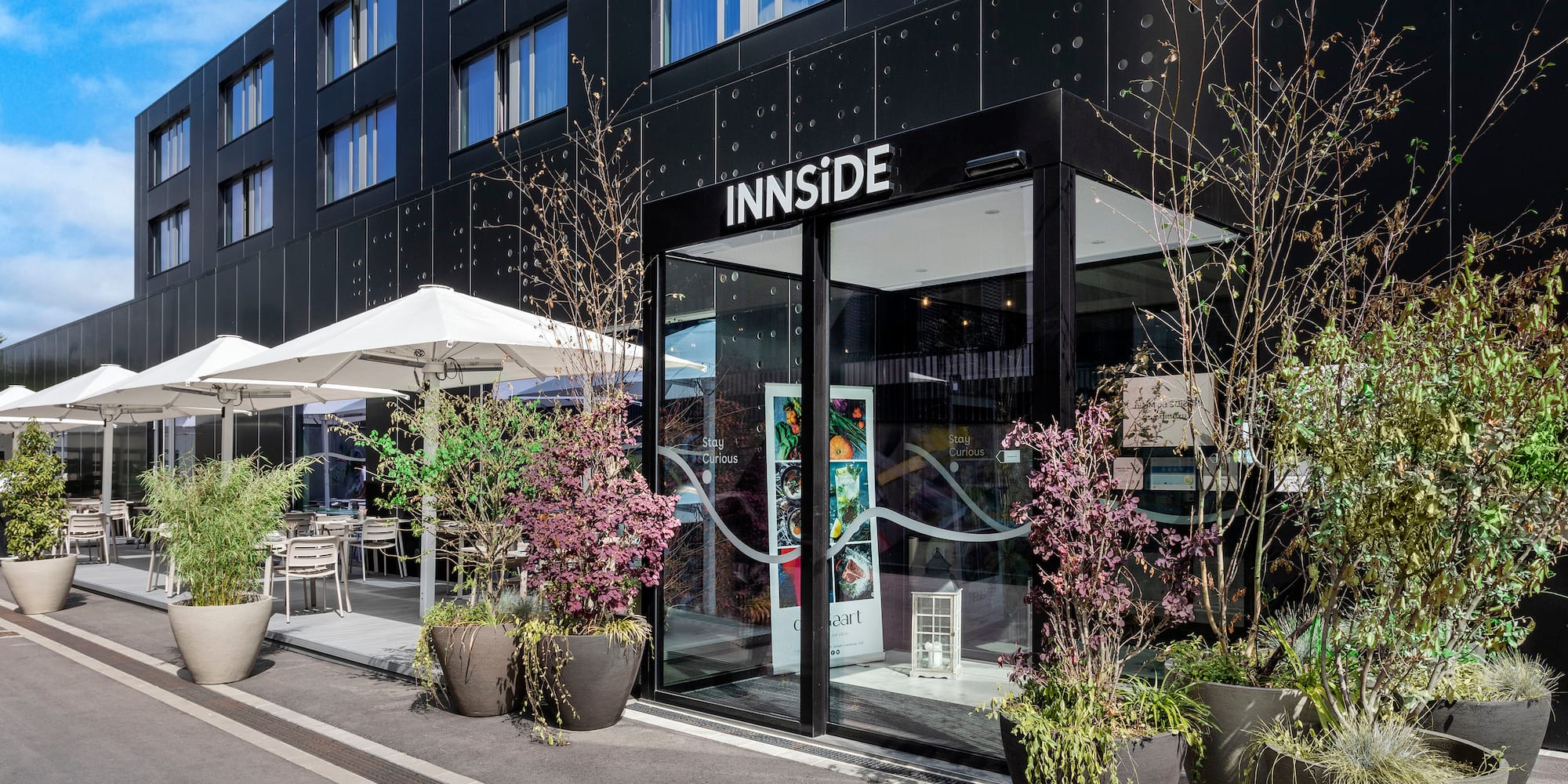 a building with a glass door and a sign